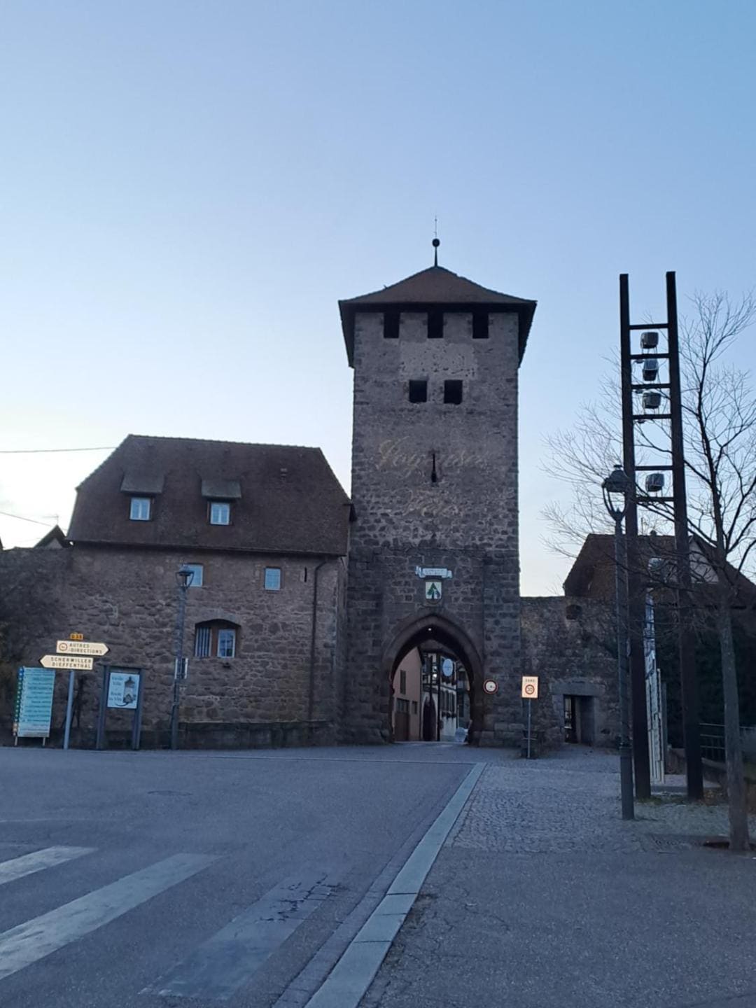 The medieval fortified gate of Dambach-la-Ville at dusk
